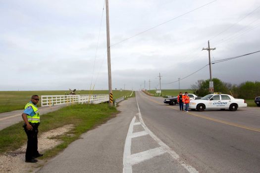 Emergency personnel block the road to the Texas City Dike following a barge collision in the ship channel, causing an oil spill Saturday, March 22, 2014, in Houston. Photo: Brett Coomer, Houston Chronicle / © 2014 Houston Chronicle