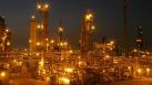 Lights sparkle in a night photograph of Petrobras' Pasadena refinery. Petrobras is Brazil's national oil company.