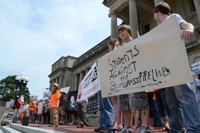 Land owners and protesters gather on the steps of the Kentucky state capitol in Fronkfort, Ky., on Wednesday, Aug. 7, 2013, to opposed a pipeline that would carry flammable liquids through northern Kentucky.