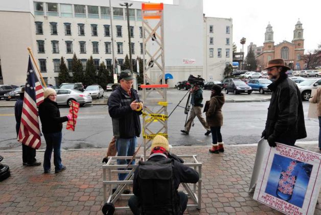 Anti-fracking demonstrators organized by Occupy Albany protest in front of the DEC building in Albany,NY Thursday, Jan.12, 2012. ( Michael P. Farrell/Times Union) Photo: Michael P. Farrell