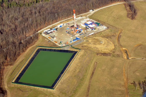 frack pit next to drilling pad