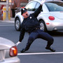 Retired police officer Tony Lepore performs his dance routine while directing traffic in 2004 in downtown Providence, R.I.