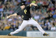  Pirates pitcher Mark Melancon celebrates after getting the final out against the Tigers at PNC Park Aug. 12.