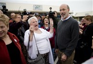  Pennsylvania Democratic Gov.-elect Tom Wolf meets with well-wishers outside the Manchester Cafe the day after he won the gubernatorial election, Wednesday in Manchester, York County.