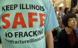 A protester against fracking attends a rally after a House Committee hearing on hydraulic fracturing legislation at the state Capitol in Springfield, Ill. (AP Photo/Seth Perlman, File)