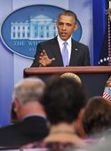 U.S. President Barack Obama pauses as he speaks on the Affordable Care Act in the Brady Press Briefing Room of the White House on November 14, 2013 in Washington, D.C. 