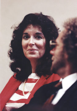 Virginia Larzelere smiles at her defense attorney, Jack Wilkins, during a pause in her 1992 trial.
