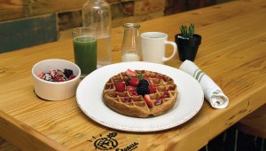 Not fancy, just fabulous: Righteous Foods’ multigrain waffle with fresh fruit juice and acai bowl.