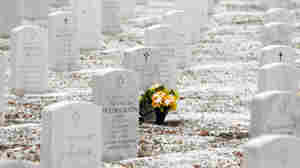 Fort Logan National Cemetery in Sheridan, Colo., gets a fresh dusting of snow on Veterans Day.