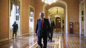 Senate Republican leader Mitch McConnell of Kentucky walks to his office to meet with new GOP senators-elect at the Capitol on Wednesday.