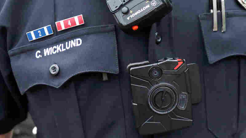 Few police departments have required officers to wear body cameras, but that's changing after the events in Ferguson, Mo., this summer.