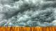 Southern storm: Sinister clouds roll above a fence