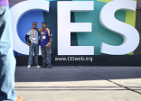 Attendees take their photo in front of a sign as they arrive at the 2013 International CES at the Las Vegas Convention Center on January 8, 2013 in Las Vegas, Nevada. (credit: Justin Sullivan/Getty Images)