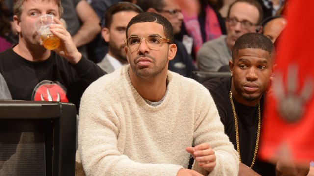 Drake attends the game between the Toronto Raptors and Philadelphia 76ers on November 9, 2014 at the Air Canada Centre in Toronto, Ontario, Canada. (Ron Turenne/NBAE via Getty Images)