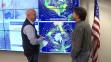 CBS4 Meteorologist Chris Spears talks with climatologist Klaus Wolter at NOAA. (credit: CBS)
