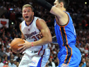 Blake Griffin #32 of the Los Angeles Clippers drives to the basket against Steven Adams #12 of the Oklahoma City Thunder during the season opening game at the Staple Center on October 30, 2014 in Los Angeles, California. (Photo by Mel Blackmon/CBS)