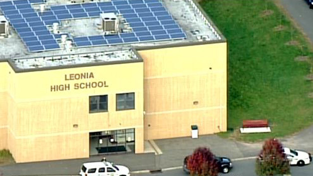 Police vehicles are seen outside Leonia High School in Leonia, N.J., following a bomb threat Nov. 12, 2014. (credit: CBS2)