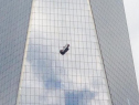 Both window washers safely pulled inside 1WTC after firefighters cut through the glass. (Credit: Alex Silverman/WCBS 880)