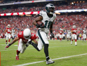 GLENDALE, AZ - OCTOBER 26:  Wide receiver Jeremy Maclin #18 of the Philadelphia Eagles scores a 21 yard reception against free safety Rashad Johnson #26 of the Arizona Cardinals in the first quarter of the NFL game at the University of Phoenix Stadium on October 26, 2014 in Glendale, Arizona.  (Photo by Christian Petersen/Getty Images)