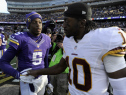 Teddy Bridgewater #5 of the Minnesota Vikings and Robert Griffin III shake hands after the game. The Vikings defeated the Redskins 29-26. (Photo by Hannah Foslien/Getty Images)