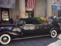 An antique car from Gormley Funeral Home with flowers. (Image Credit: Andrea Courtois/WBZ)
