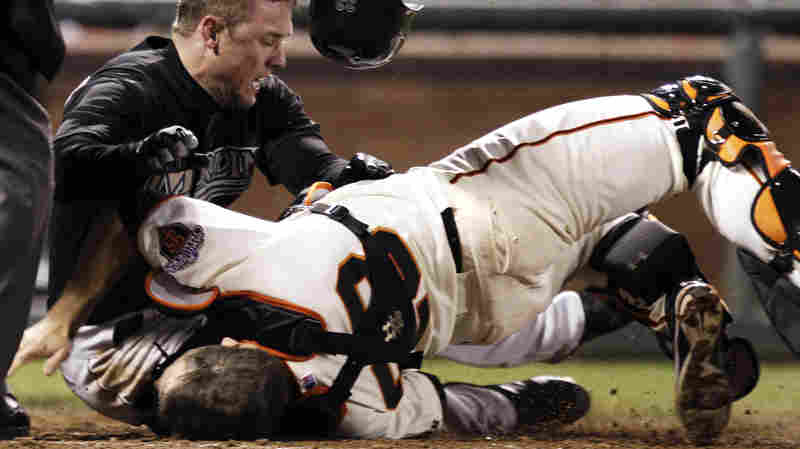 A 2011 collision that left San Francisco Giants catcher Buster Posey with a broken leg sparked an MLB debate about preventing injuries. Many collisions have caused head injuries, but a bigger risk to catchers is foul tips.