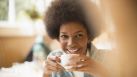 Woman drinking coffee in cafe