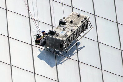 The window washers were rescued from the south side of 1 World Trade Center on Wednesday.