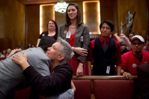 Debbie Kelly, center, embraces Melanie Pang. Photo: Marie D. De Jesus, Houston Chronicle / © 2014 Houston Chronicle
