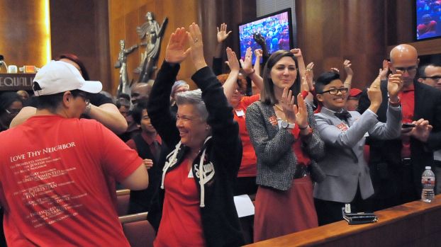 Debbie Kelly, second from left, joins in the celebration after approval of the equal rights ordinance. Photo: © Tony Bullard 2014, Tony Bullard / © Tony Bullard & the Houston Chronicle