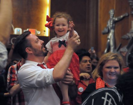 Ryan Leach holds Madeleine Schimmer, 4, as they and her mother, Sarah Schimmer, celebrate with a crowd at City Hall after the vote.  Photo: © Tony Bullard 2014, Tony Bullard / © Tony Bullard & the Houston Chronicle