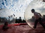 Silhouetted bubble runners spend the day playing at the 19th Annual Children Festival, Saturday, Nov. 8, 2014, in the Woodlands.