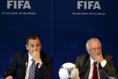 Hans-Joachim Eckert, right, who heads the adjudicatory arm of FIFA’s ethics committee, released his 42-page summary after reviewing the work of Michael J. Garcia, left, the head of the investigatory chamber of the committee.