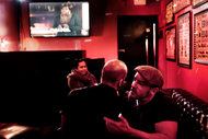 Ben Maisani, right, an owner of the Atlas Social Club, a gay bar where “How to Get Away With Murder,” on the TV at back, is a Thursday night ritual.