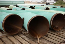 Pieces of pipes stored at the pipe yard for the Houston Lateral Project, a component of the Keystone pipeline system, are pictured in Houston, Texas March 5, 2014. REUTERS/Rick Wilking 