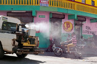 Fumigating against mosquitoes in Santo Domingo in the Dominican Republic.