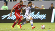 Landon Donovan of the Los Angeles Galaxy races for the ball with Adam Moffat of FC Dallas at StubHub Center on September 20, 2014 in Los Angeles, California. (credit: Stephen Dunn/Getty Images)