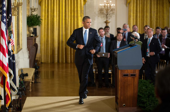 President Obama arrives for a news conference in the East Room of the White House on Wednesday.