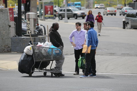 Joseph Gotesman, right, and other VetConnect workers made rounds in the Hunts Point section of the Bronx in May.
