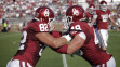 Tight end Brannon Green #82 and fullback Aaron Ripkowski #48 of the Oklahoma Sooners warmup before a game  (Photo by Brett Deering/Getty Images)
