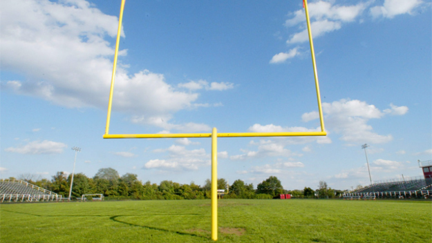 A high school football field sits empty. (credit: AP Photo)