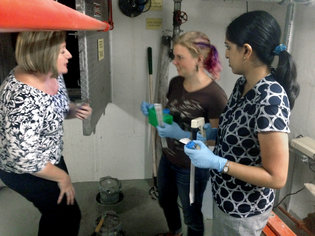 From left, Jane M. Carlton, a New York University geneticist, with her students Julia Maritz and Susan Joseph. Dr. Carlton hopes to uncover trends in infectious diseases through wastewater.