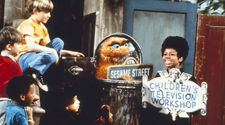Susan (Loretta Long) and Oscar the Grouch in 1969, the first season for “Sesame Street.”