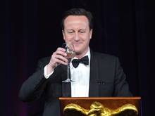 File: David Cameron offers a toast during a State Dinner in his honour March 14, 2012