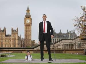 13 November 2014: The shortest man ever, Chandra Bahadur Dangi meets the worlds tallest man, Sultan Kosen for the very first time in London
