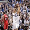 Nowitzki achieves scoring milestone in Mavs' victory over Sacramento