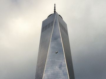 Two workers dangled from a scaffold at One World Trade Center after ropes malfunctioned. Both were uninjured, but the cause is still under investigation.