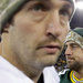 The Bears’ Jay Cutler, left, and the Packers’ Aaron Rodgers after Green Bay's blowout win Sunday.