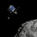 An artist's impression of the Philae lander, center, falling from the European Space Agency's Rosetta spacecraft toward 67P/Churyumov-Gerasimenko.