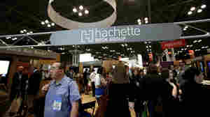 Visitors walk through the Hachette Book Group's exhibition in May at BookExpo America, the annual industry convention in New York.